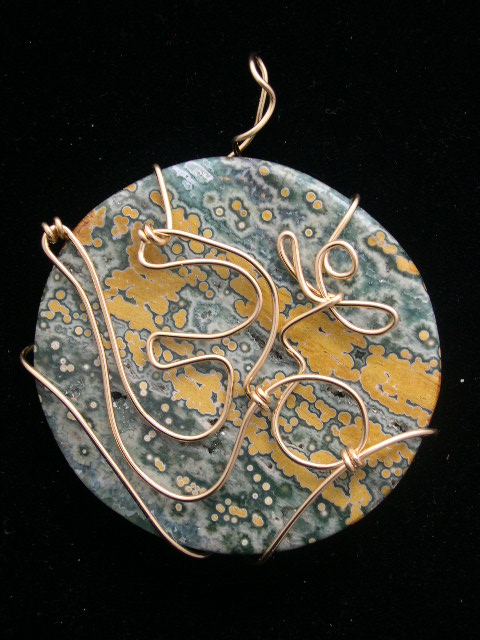 THE "OM" SYMBOL PENDANT