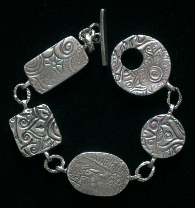 COLLAGED LOCKET BRACELET