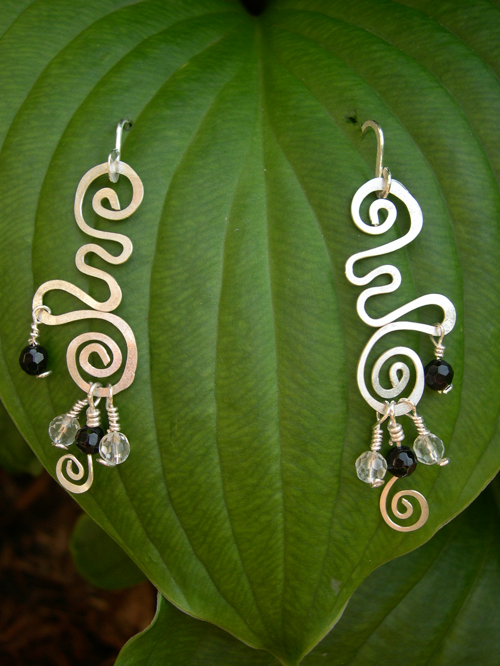 BLACK ONYX AND CRYSTAL QUARTZ WHIMSICAL EARRINGS