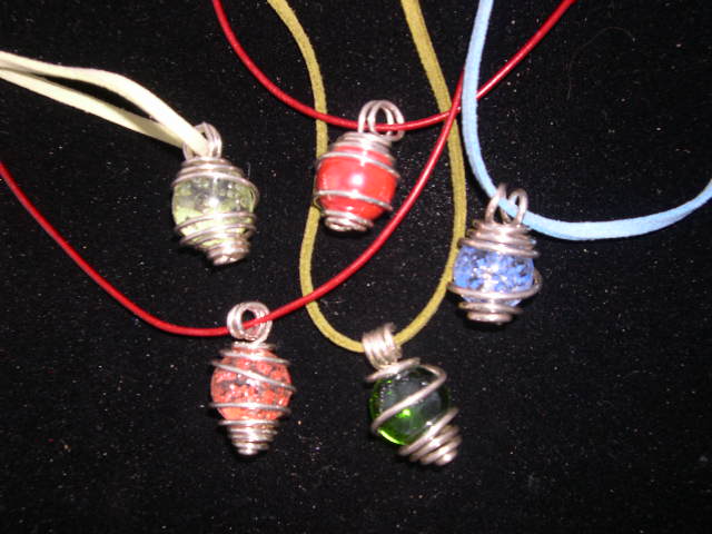 ASSORTMENT OF MULTI-COLORED GLASS MARBLE PENDANTS